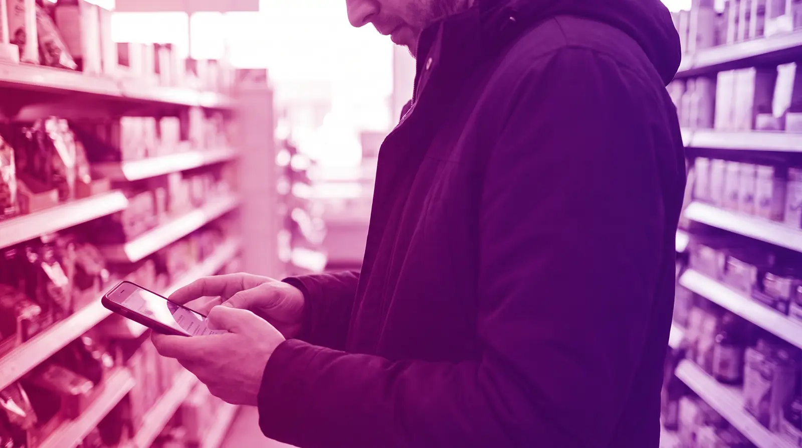 A shopper reads detailed customer reviews on a phone