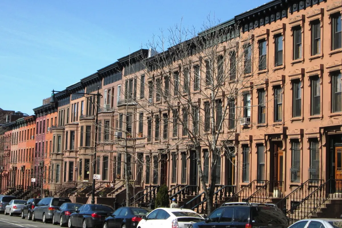 A long row of brownstones on 9th Street in Park Slope, Brooklyn