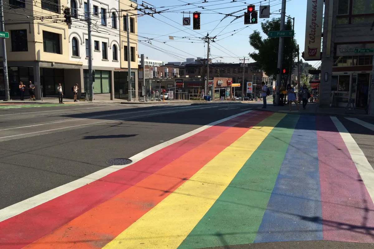 A rainbow crosswalk at an intersection on Capitol Hill in Seattle