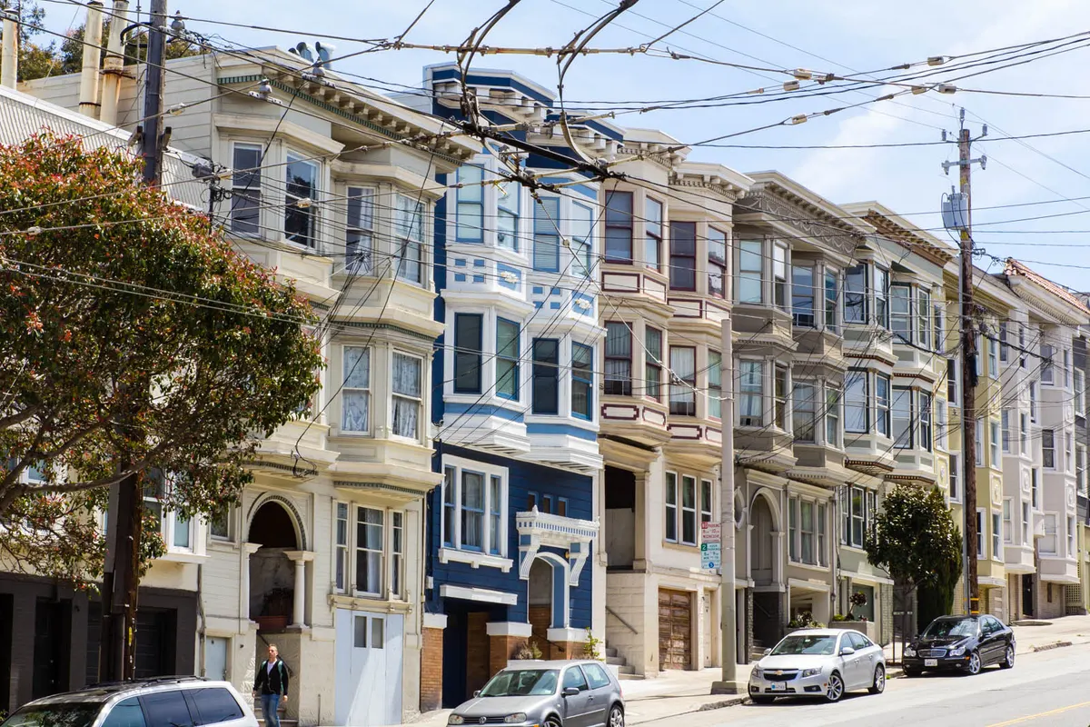 A row of painted Victorian houses along Castro Street in San Francisco