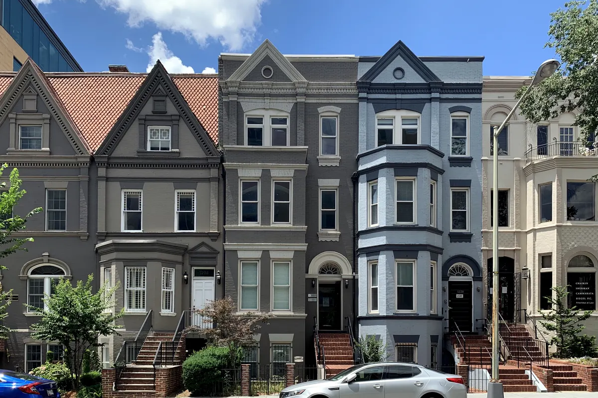 Victorian rowhouses painted gray, slate and cream on 17th Street NW in Dupont Circle