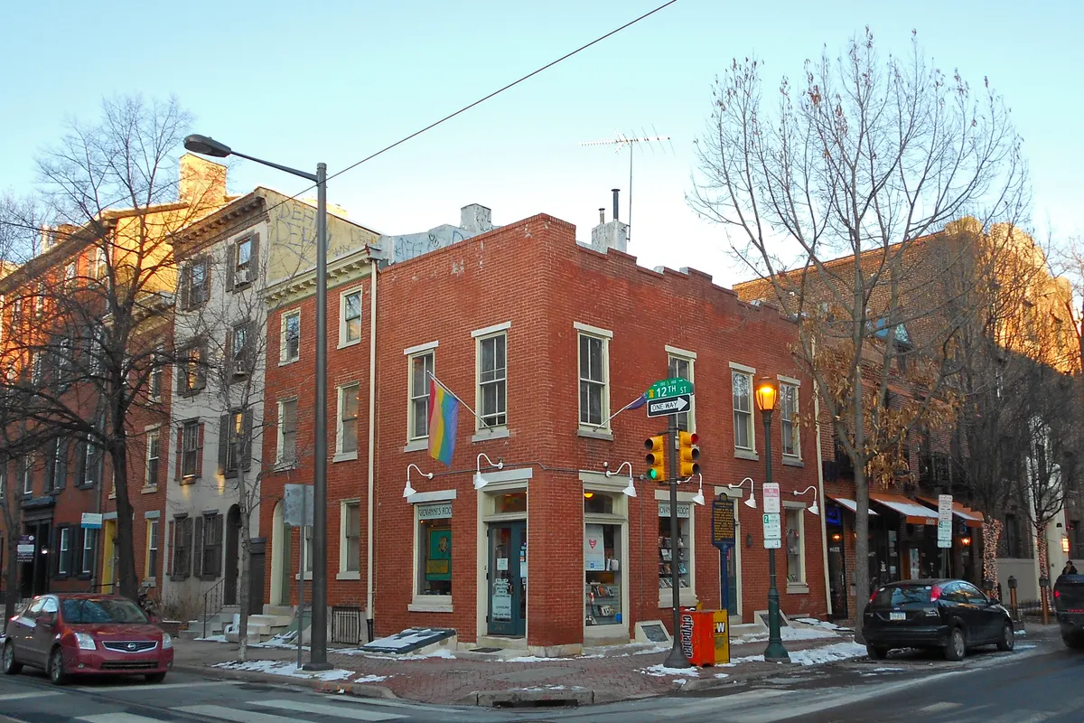 The brick corner building of Giovanni's Room at 12th and Pine streets in Philadelphia