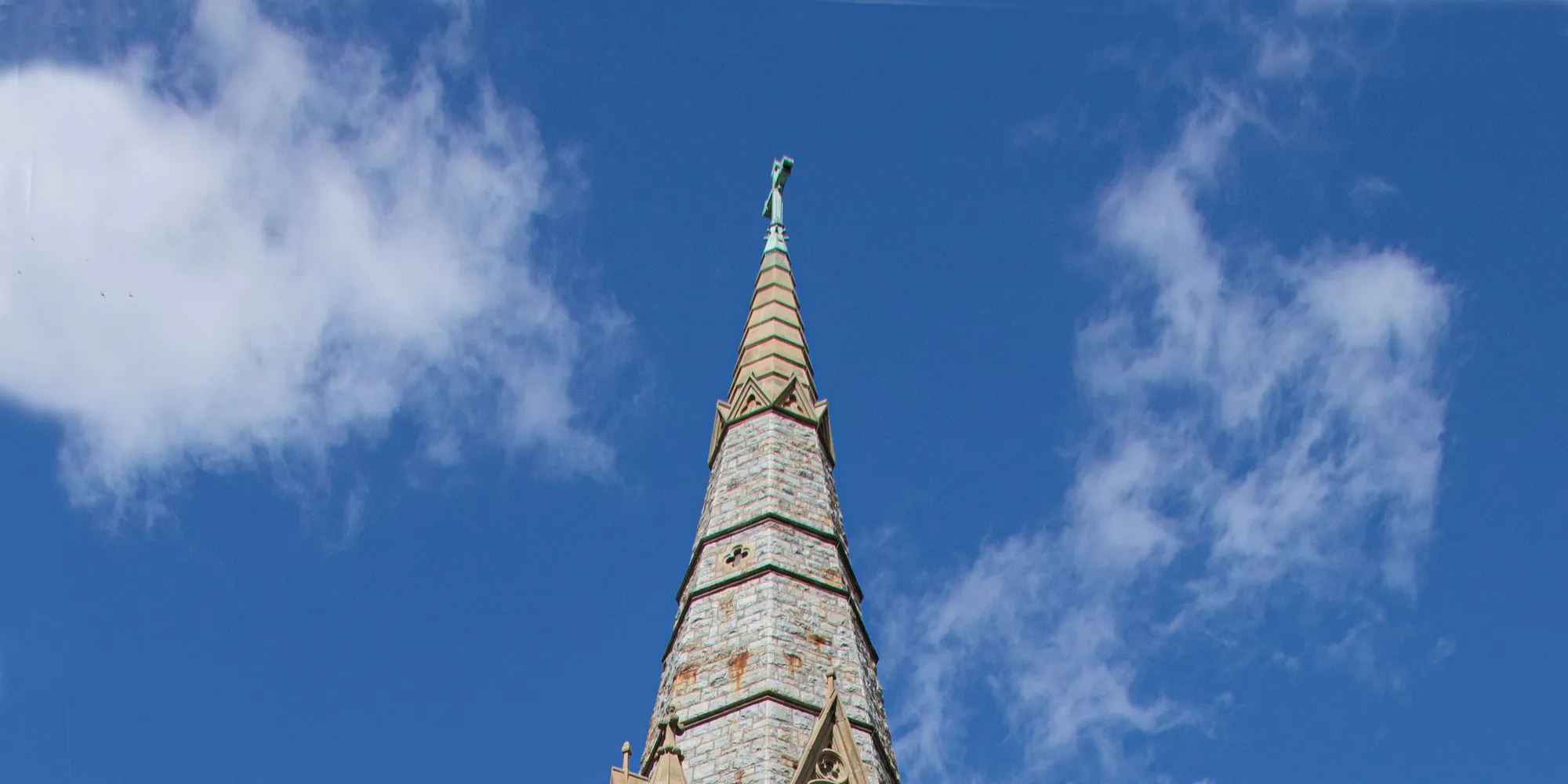 A church spire in Bethlehem, Pennsylvania against a blue sky