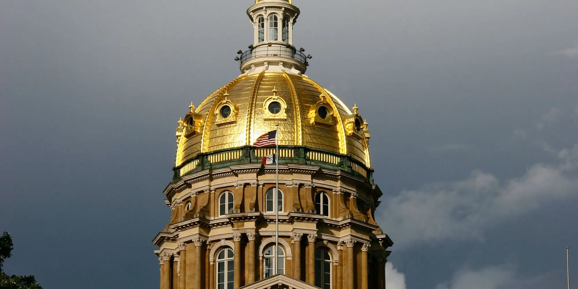 The gold dome of the Iowa State Capitol in Des Moines