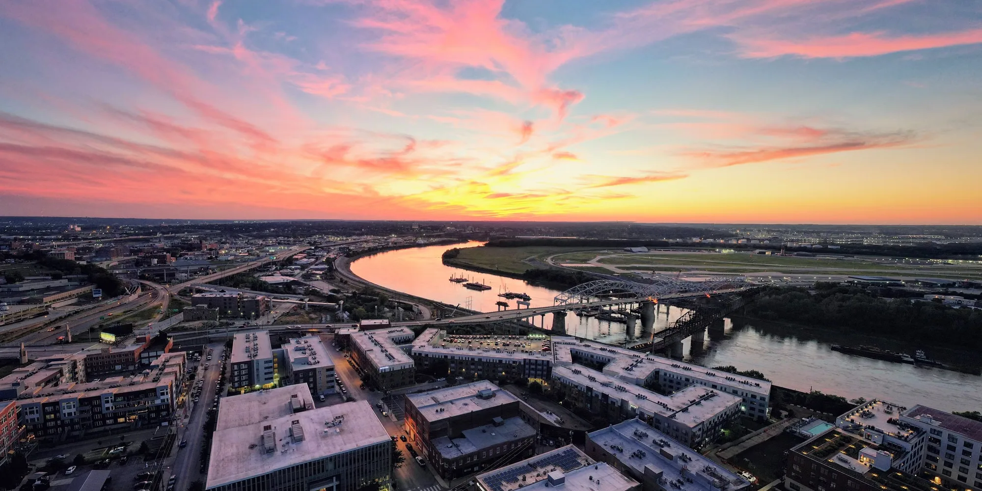 The Kansas City skyline and the river at sunset