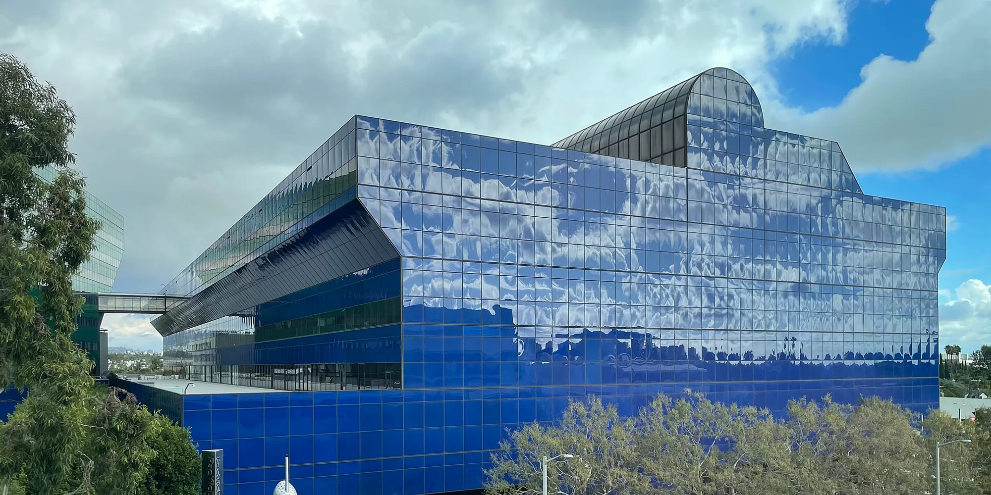 The Pacific Design Center in West Hollywood, its blue glass facade against a bright sky