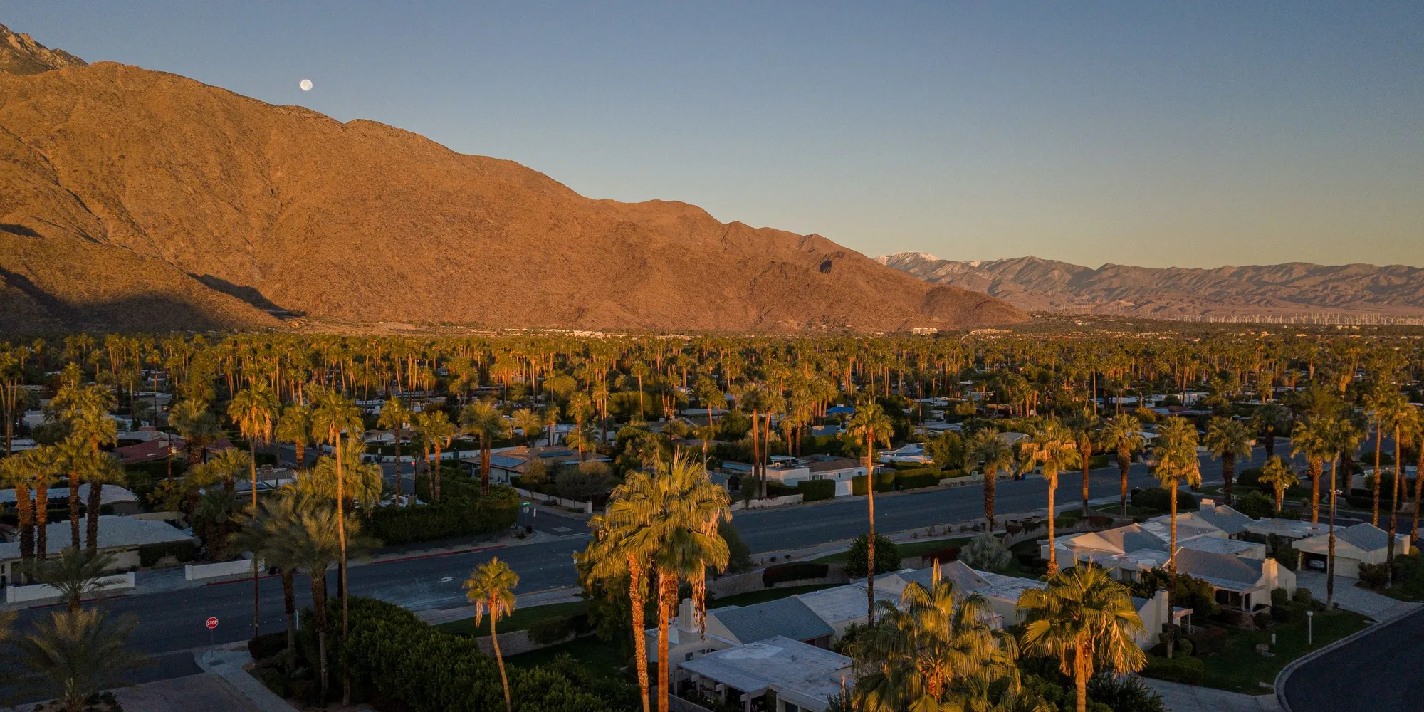 Palm Springs at golden hour beneath Mount San Jacinto