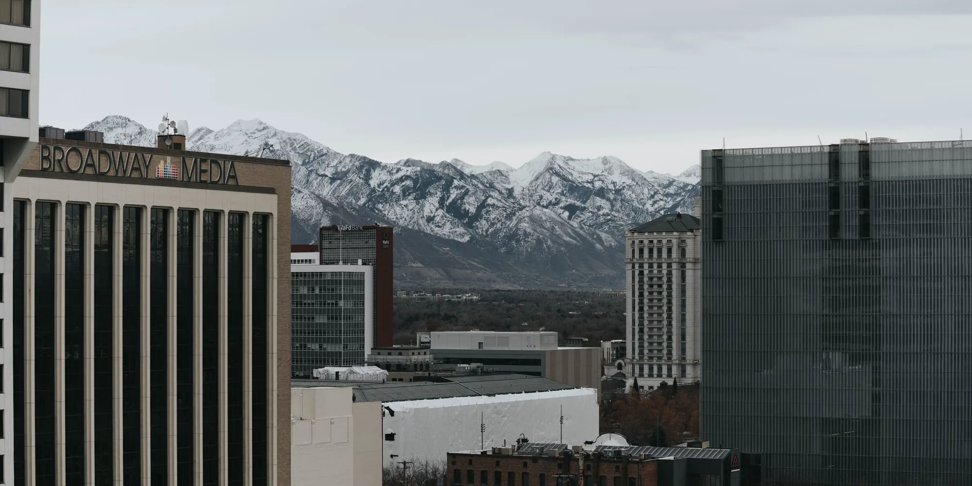 Downtown Salt Lake City below the snow-covered Wasatch Range