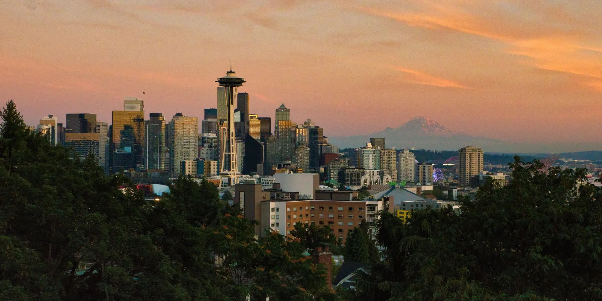The Seattle skyline with the Space Needle and Mount Rainier behind it