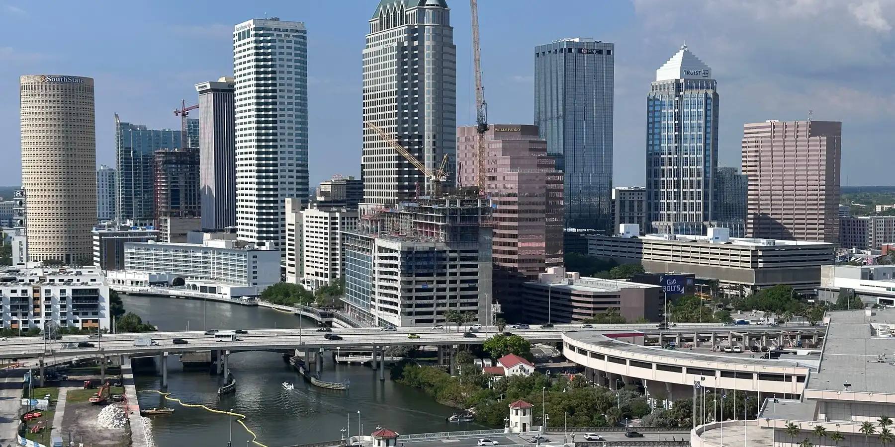 Downtown Tampa across the Hillsborough River, with the Riverwalk bridges in the foreground