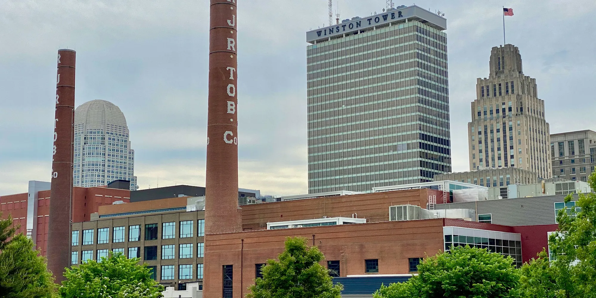 The Winston-Salem skyline with the R. J. Reynolds tobacco chimney in front of it